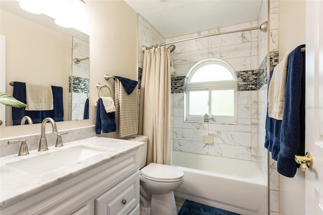 full bathroom with shower / bath combo with shower curtain, vanity, and toilet