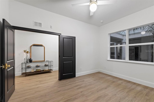 bedroom featuring ceiling fan and light hardwood / wood-style floors