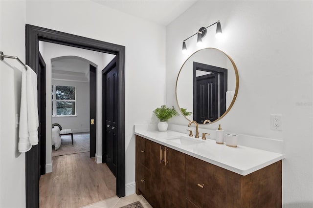 bathroom featuring vanity and hardwood / wood-style floors