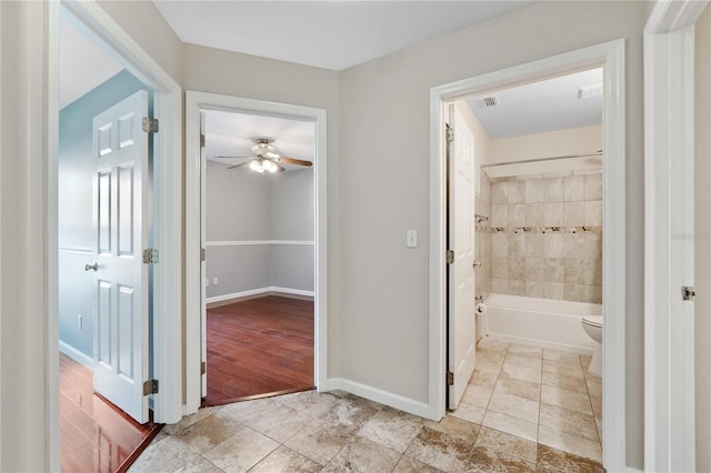 hall with light hardwood / wood-style floors