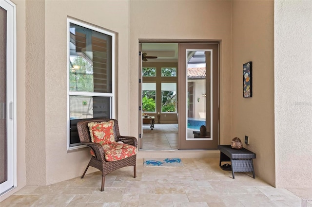 doorway to property with a patio