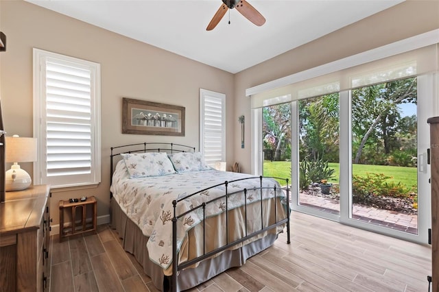 bedroom featuring access to exterior and ceiling fan