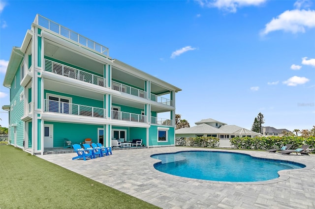 view of pool with a patio