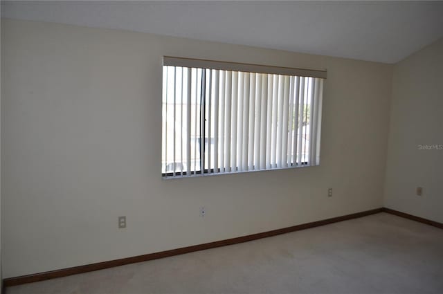 empty room with carpet flooring