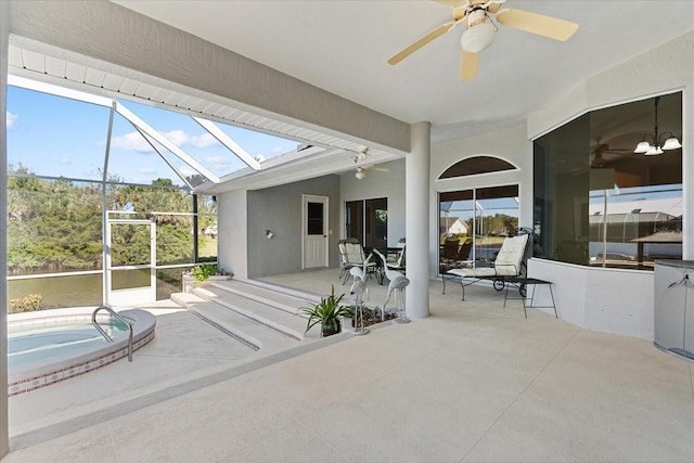 sunroom featuring vaulted ceiling and ceiling fan with notable chandelier