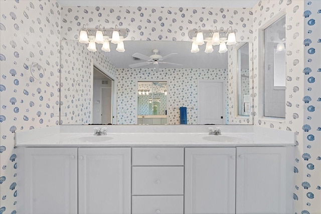 bathroom featuring ceiling fan and vanity