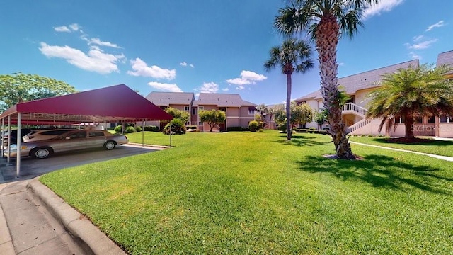 view of yard featuring a carport