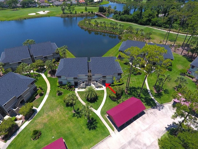 drone / aerial view featuring a water view