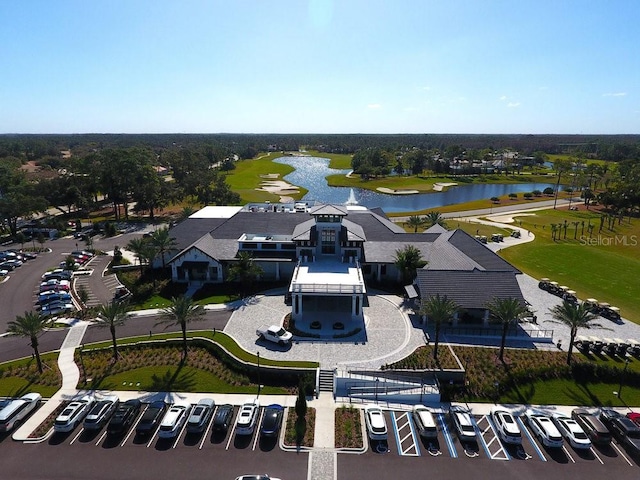 drone / aerial view with a water view