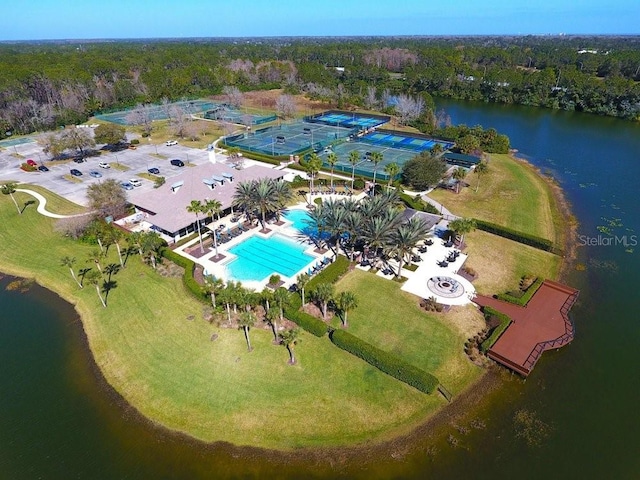 birds eye view of property with a water view