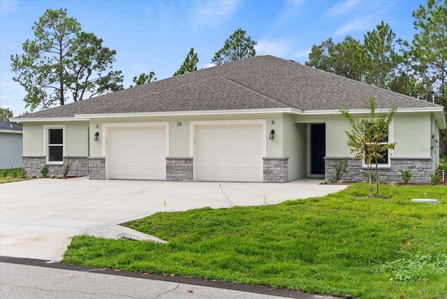 view of front of home with a garage and a front yard