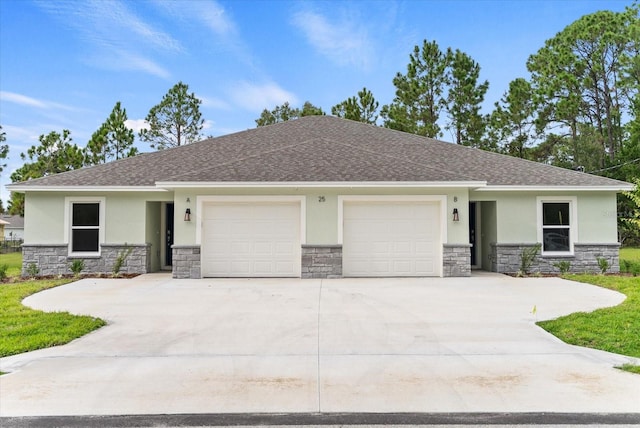 view of front of property with a garage