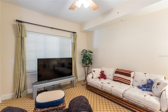 living room featuring ceiling fan and light colored carpet