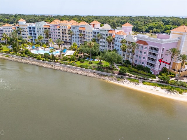 bird's eye view featuring a beach view and a water view