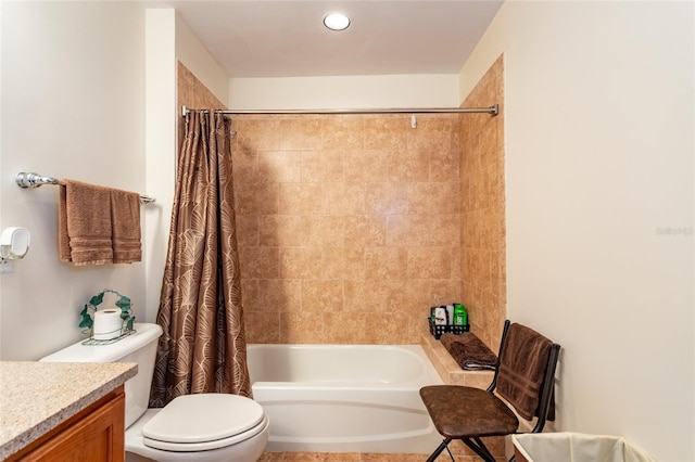 full bathroom with toilet, vanity, and shower / bath combo with shower curtain