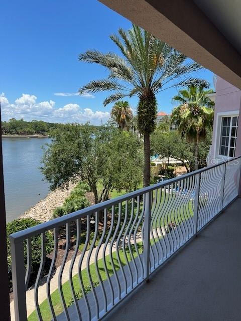 balcony featuring a water view