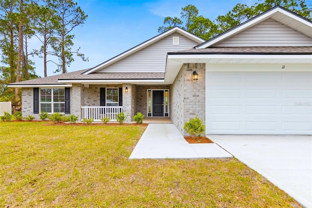 ranch-style house with a garage, a porch, and a front yard