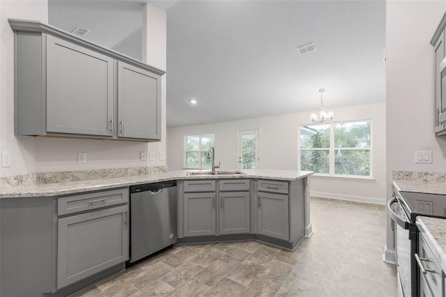 kitchen featuring gray cabinets, appliances with stainless steel finishes, and sink