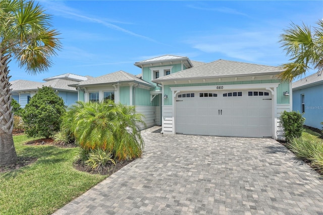 view of front of home with a garage