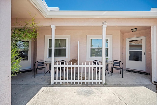 36 Coral Reef Ct N A/B, Unit A/B Palm Coast, FL 32137 - property entrance with a porch