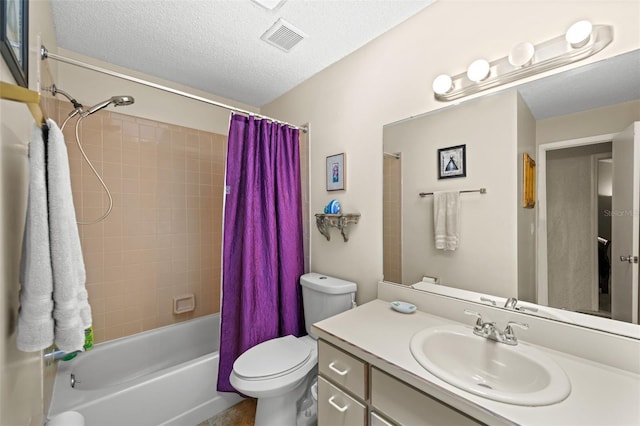 full bathroom featuring a textured ceiling, vanity, shower / bath combo, and toilet