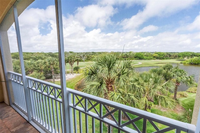 balcony featuring a water view