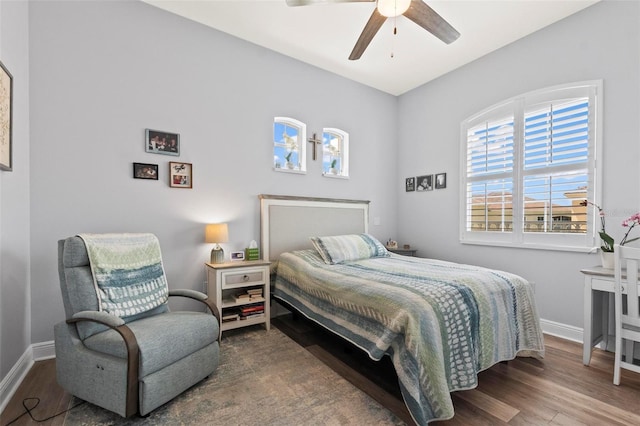 bedroom featuring hardwood / wood-style floors and ceiling fan