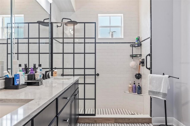 bathroom featuring vanity and walk in shower