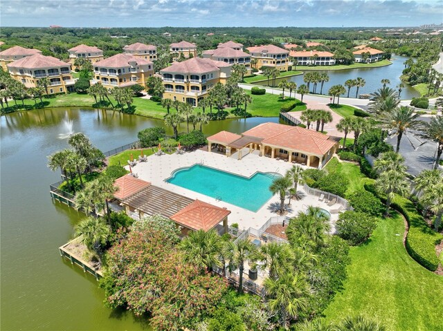 birds eye view of property featuring a water view