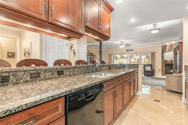 kitchen with ceiling fan, sink, black dishwasher, dark stone counters, and ornamental molding