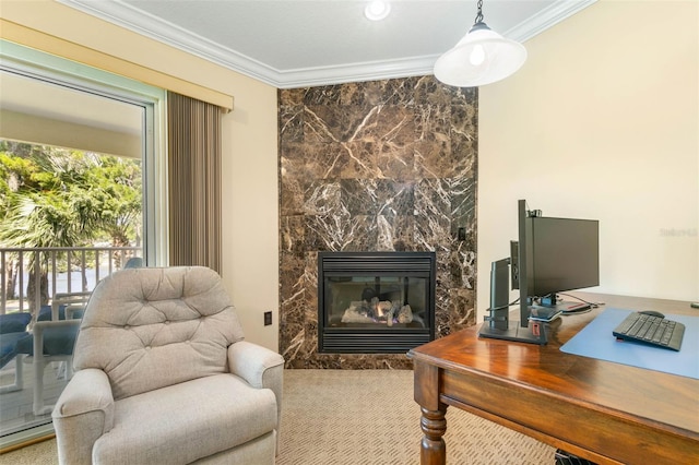 office space with crown molding and a fireplace