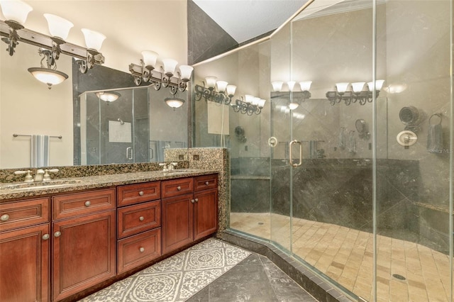 bathroom with tile patterned flooring, vanity, an enclosed shower, and lofted ceiling