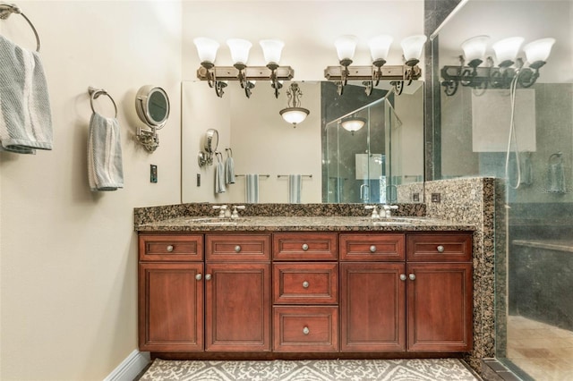 bathroom featuring vanity and a shower with shower door