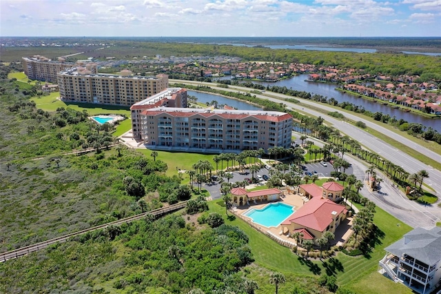 birds eye view of property featuring a water view