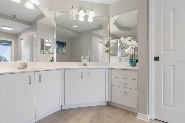 bathroom featuring tile patterned floors and vanity