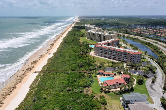 aerial view with a beach view and a water view