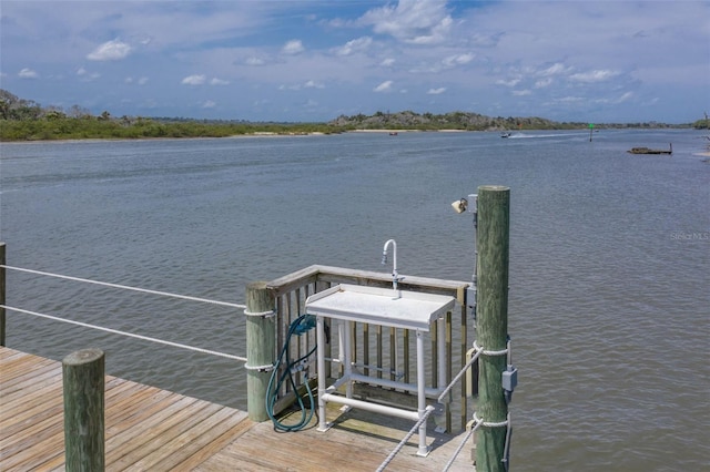 view of dock with a water view