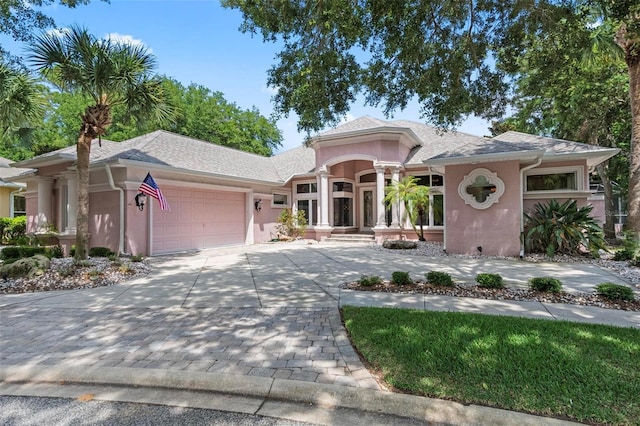 view of front of property featuring a garage