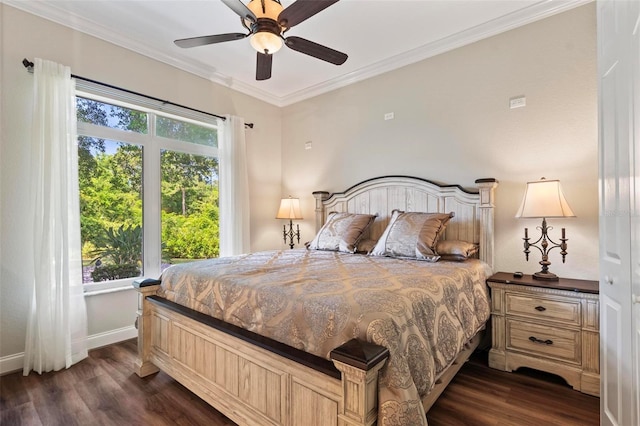 bedroom with dark hardwood / wood-style floors, ceiling fan, and ornamental molding