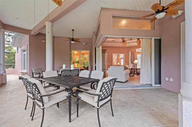 view of patio featuring ceiling fan