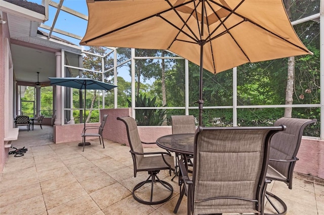 view of patio / terrace featuring a lanai