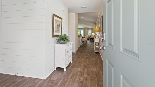 hall with dark hardwood / wood-style floors