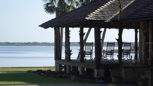 dock area featuring a gazebo and a water view