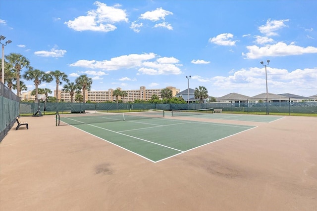 view of sport court with basketball hoop