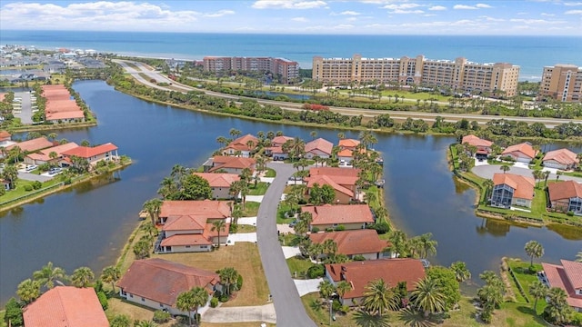 drone / aerial view with a water view