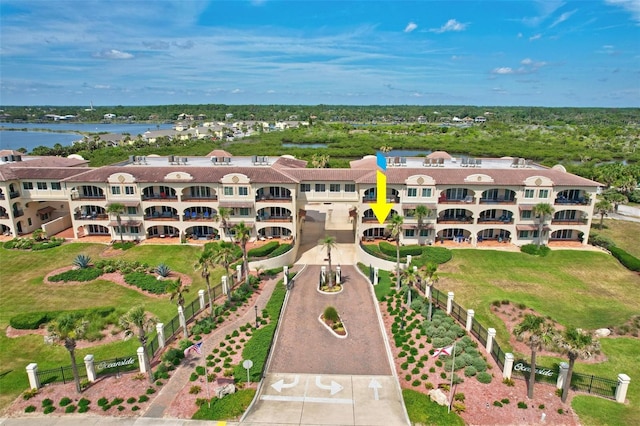 birds eye view of property featuring a water view