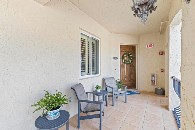 property entrance with covered porch