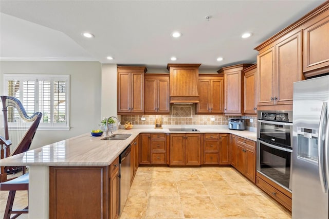 kitchen featuring custom exhaust hood, a kitchen breakfast bar, sink, kitchen peninsula, and stainless steel appliances