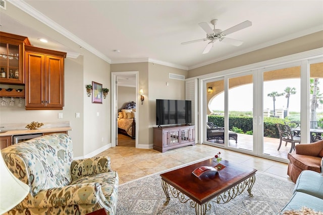 tiled living room featuring ceiling fan and ornamental molding