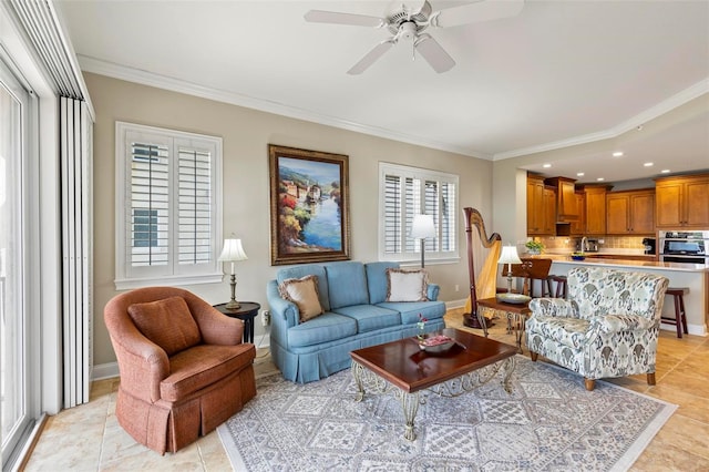 tiled living room with ceiling fan and ornamental molding